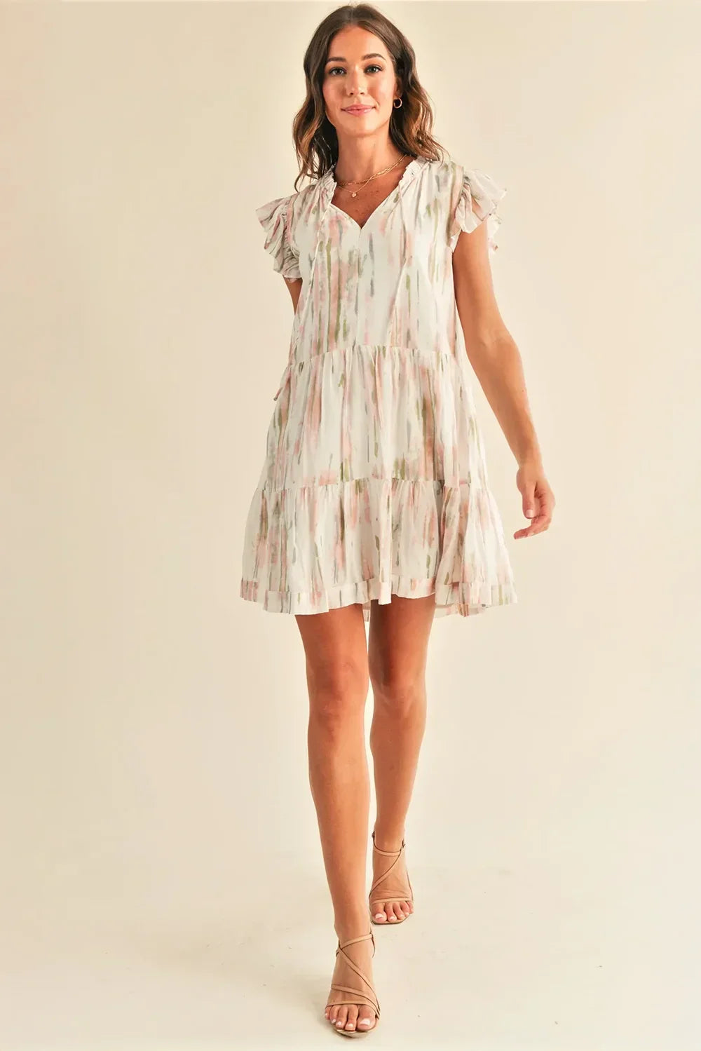 Ruffle Sleeve V Neck White Abstract Print Tiered Mini Dress - Tasha Apparel Wholesale