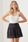 Front Out Pocket Zip Up Smocked Back Mini Skirt - Tasha Apparel Wholesale