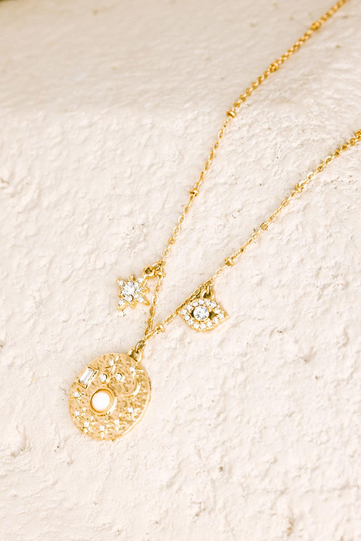 Gold Moon Star Evil Eye Rhinestone Pendent Necklace - Tasha Apparel Wholesale