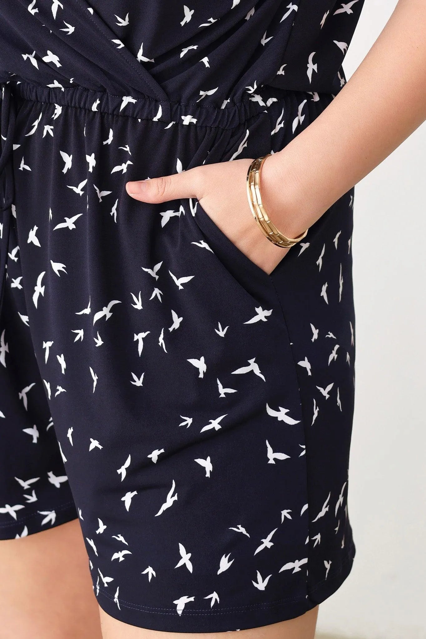 Plus Size Birds Print Short Sleeve Adjustable Belt Warp Romper - Tasha Apparel Wholesale