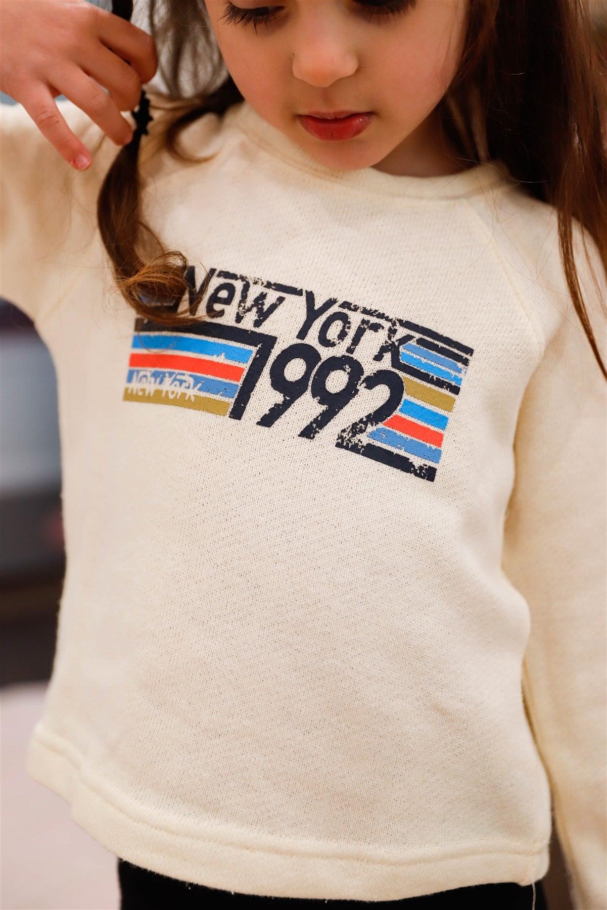 Toddler Little Girls Ivory "New York" Print Long Sleeve Top - Tasha Apparel Wholesale