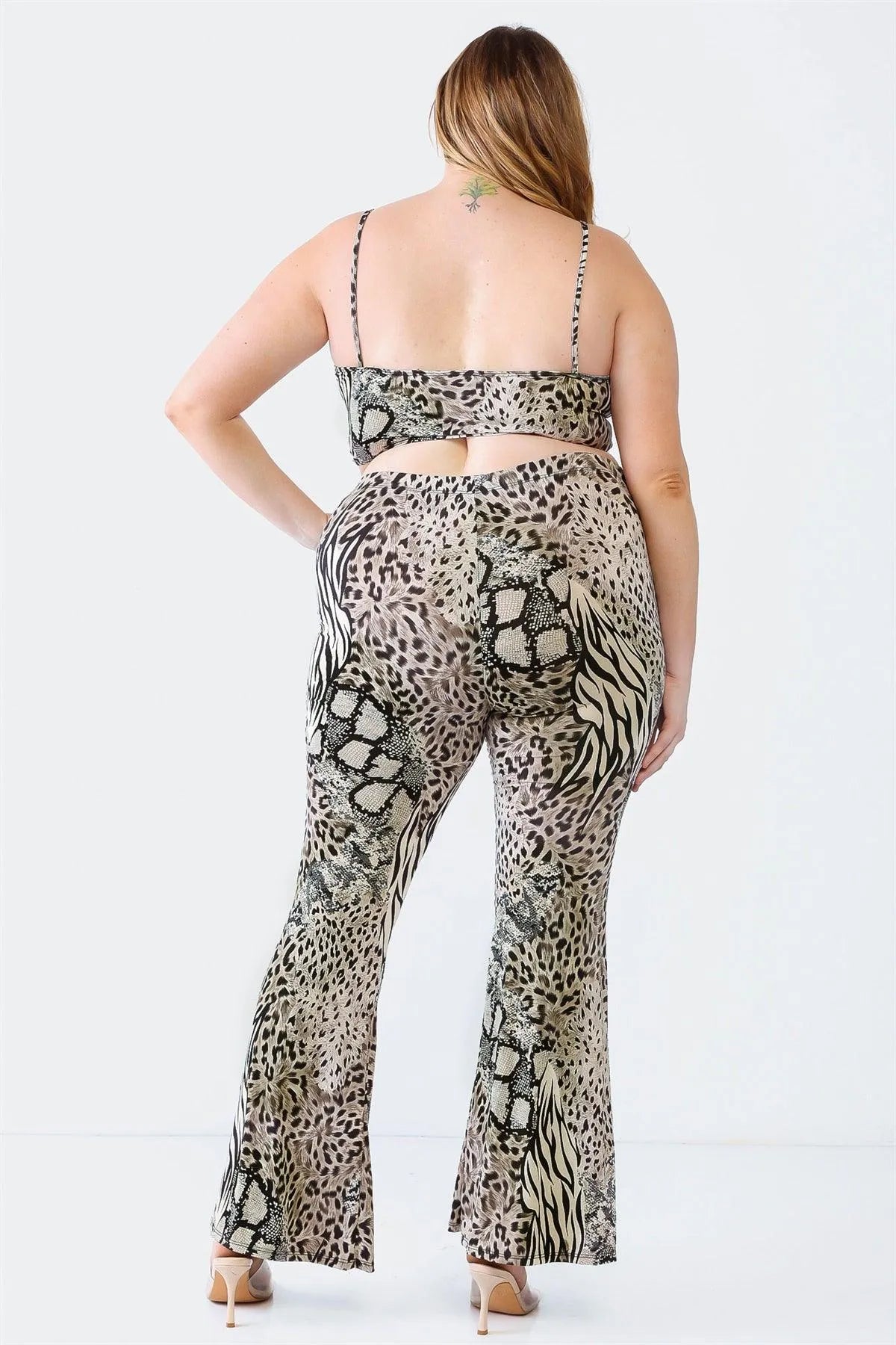 Junior Plus Animal Print Cut-Out Elasticized Jumpsuit - Tasha Apparel Wholesale