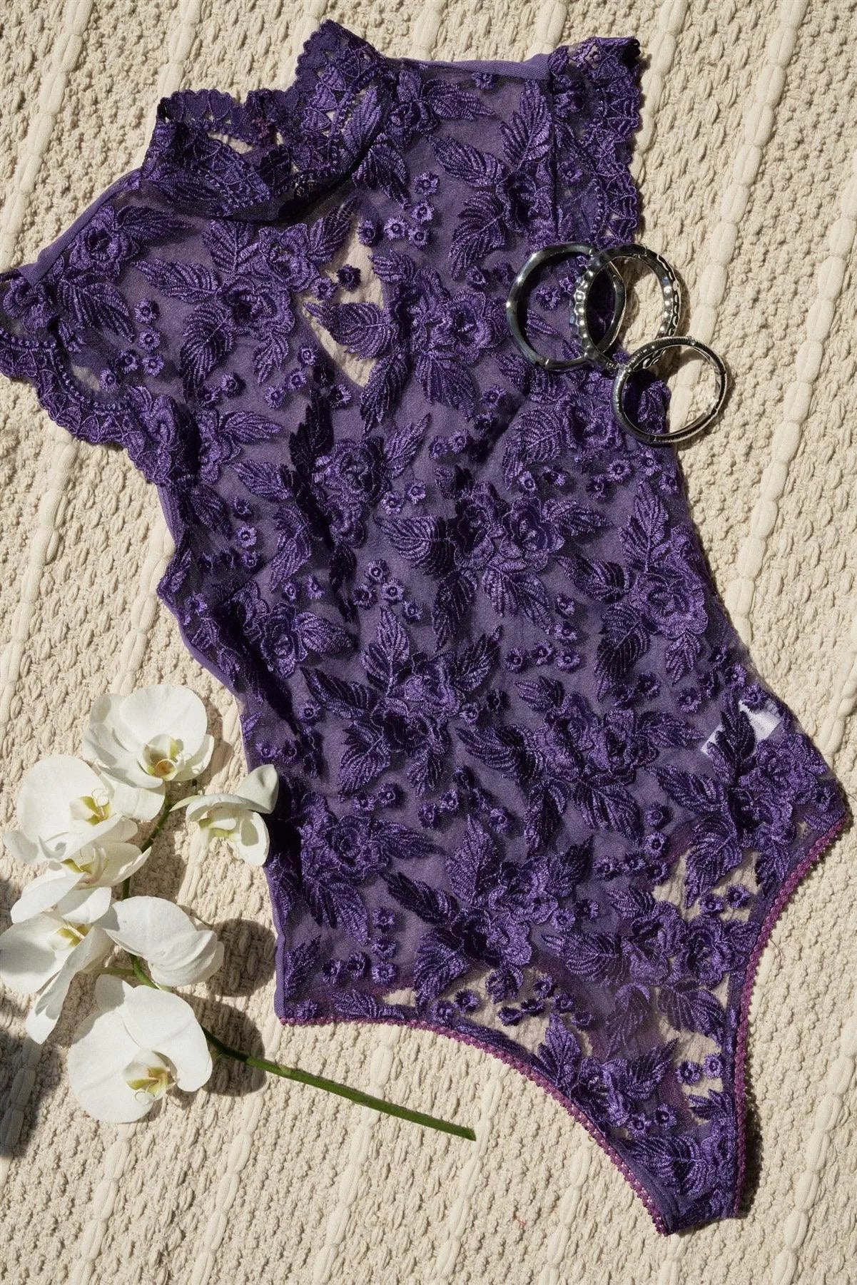 Eggplant Purple Mesh Floral Embroidered Turtle Neck Short Flutter Sleeve Bodysuit - Tasha Apparel Wholesale
