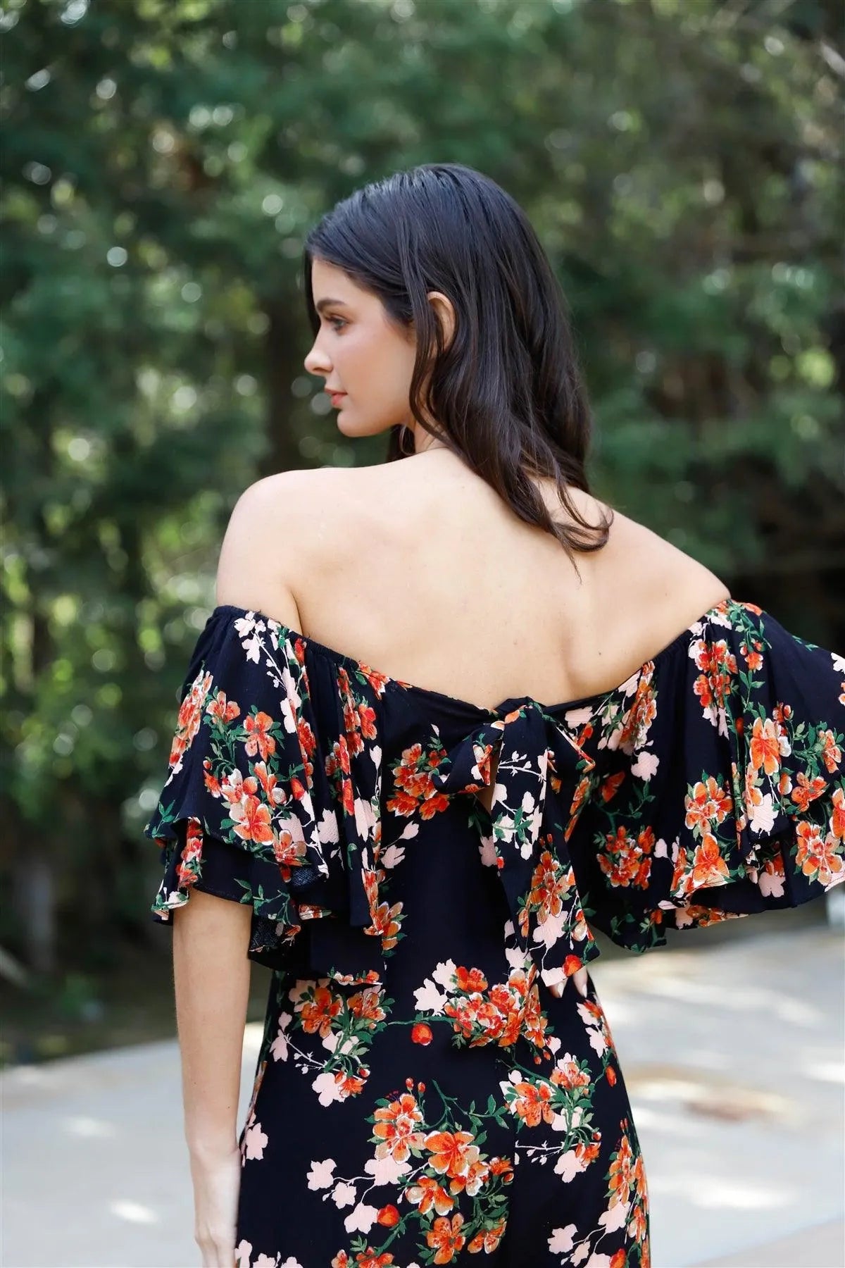 Black Multi Color Floral Print Off-The-Shoulder Flare Sleeve Back Tie Detail Wide Leg Jumpsuit /1-2-2 - Tasha Apparel Wholesale
