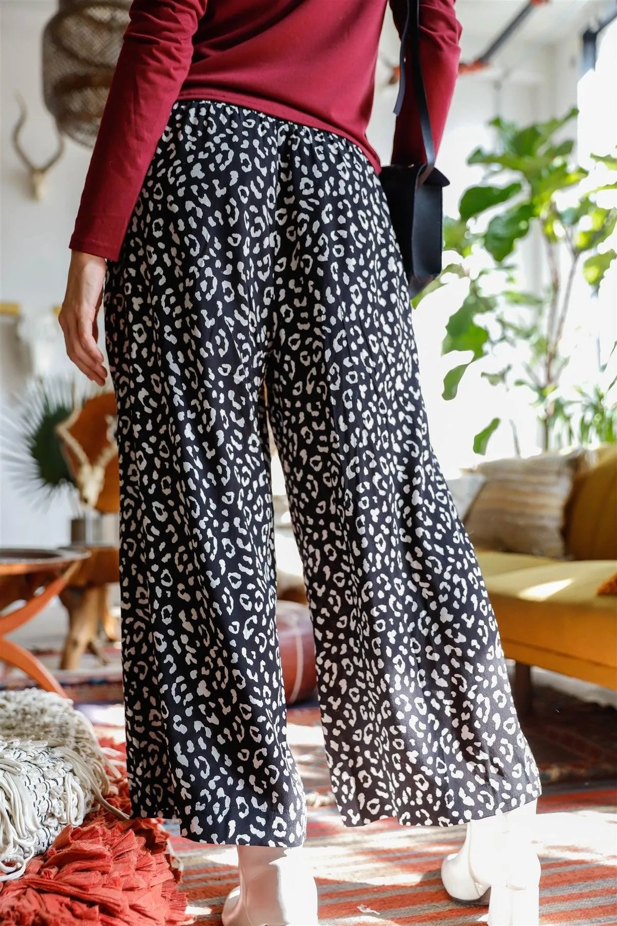 Monochrome Animal Print Smocked Ruffle Waist Wide Leg Pants /1-2-2-2 - Tasha Apparel Wholesale