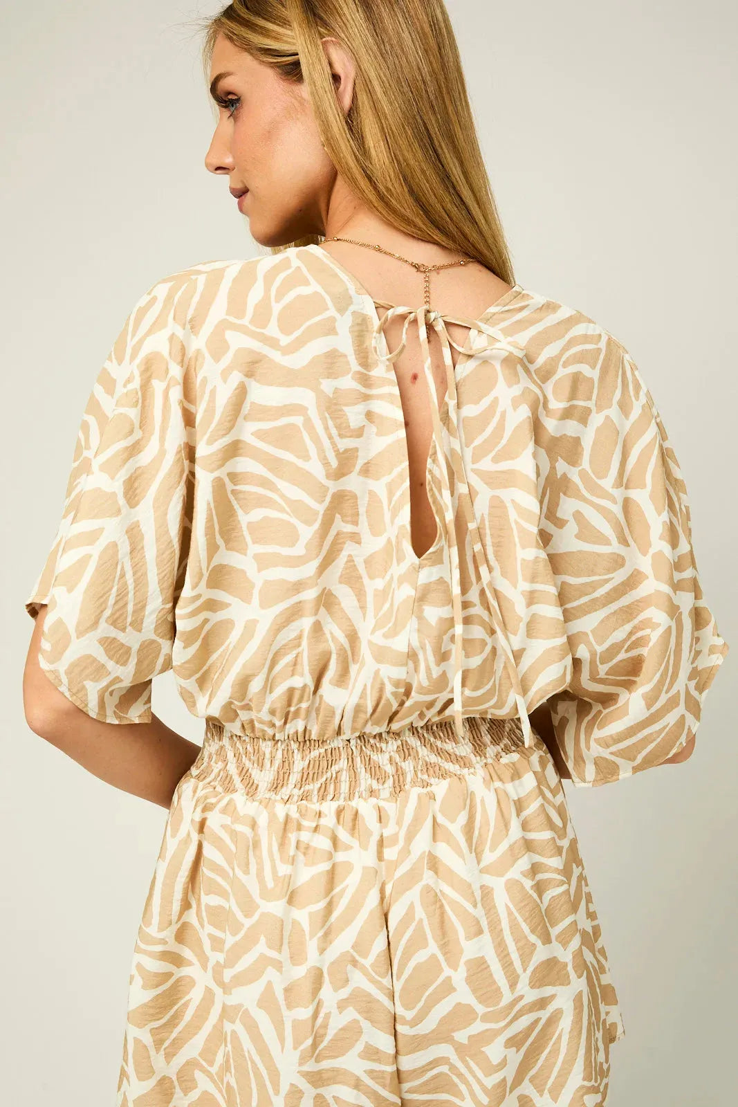 Kimono Sleeve V-Neck Pleated Smocking Abstract Romper - Tasha Apparel Wholesale