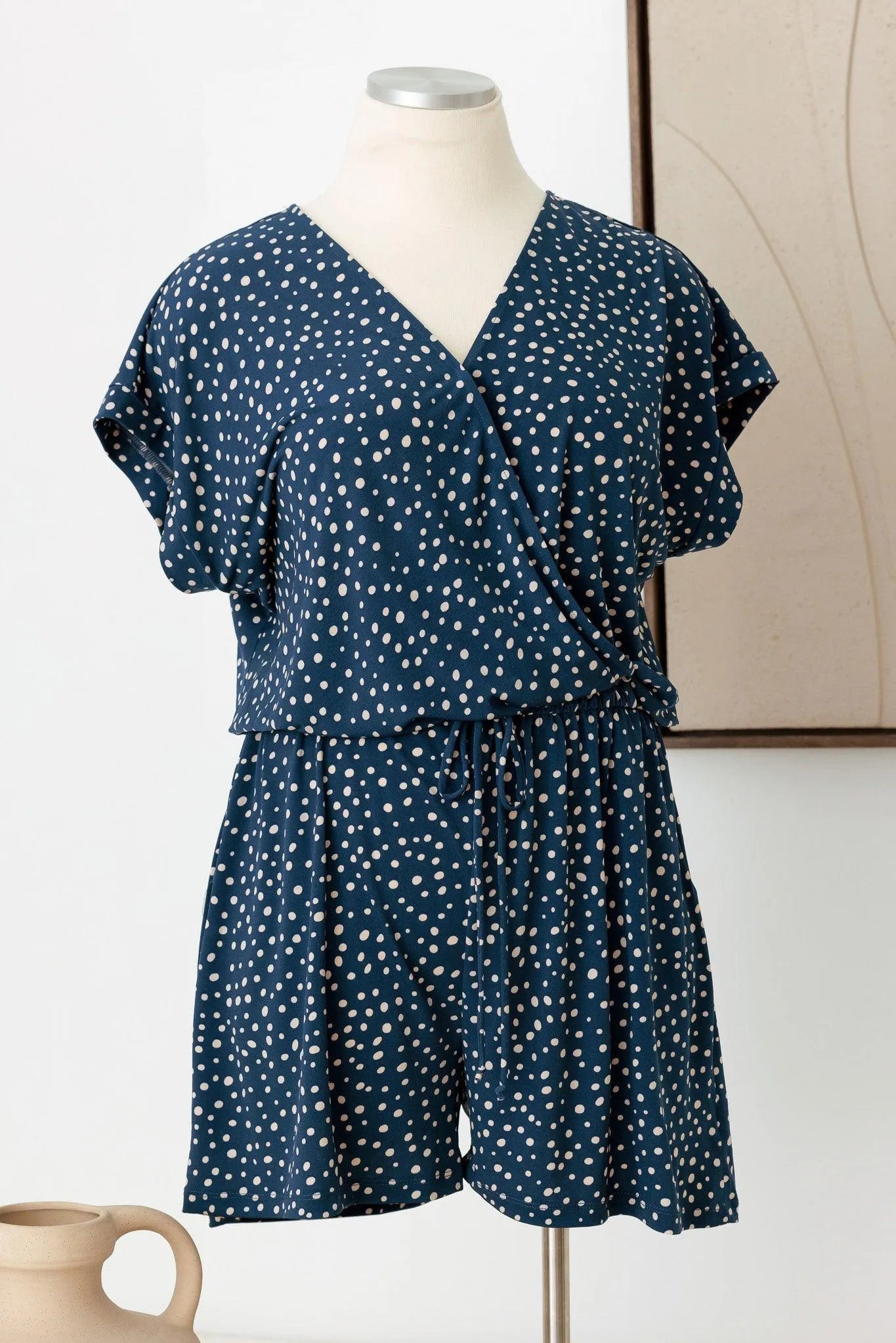 Plus Size Polka Dot Short Sleeve Adjustable Belt Warp Romper - Tasha Apparel Wholesale