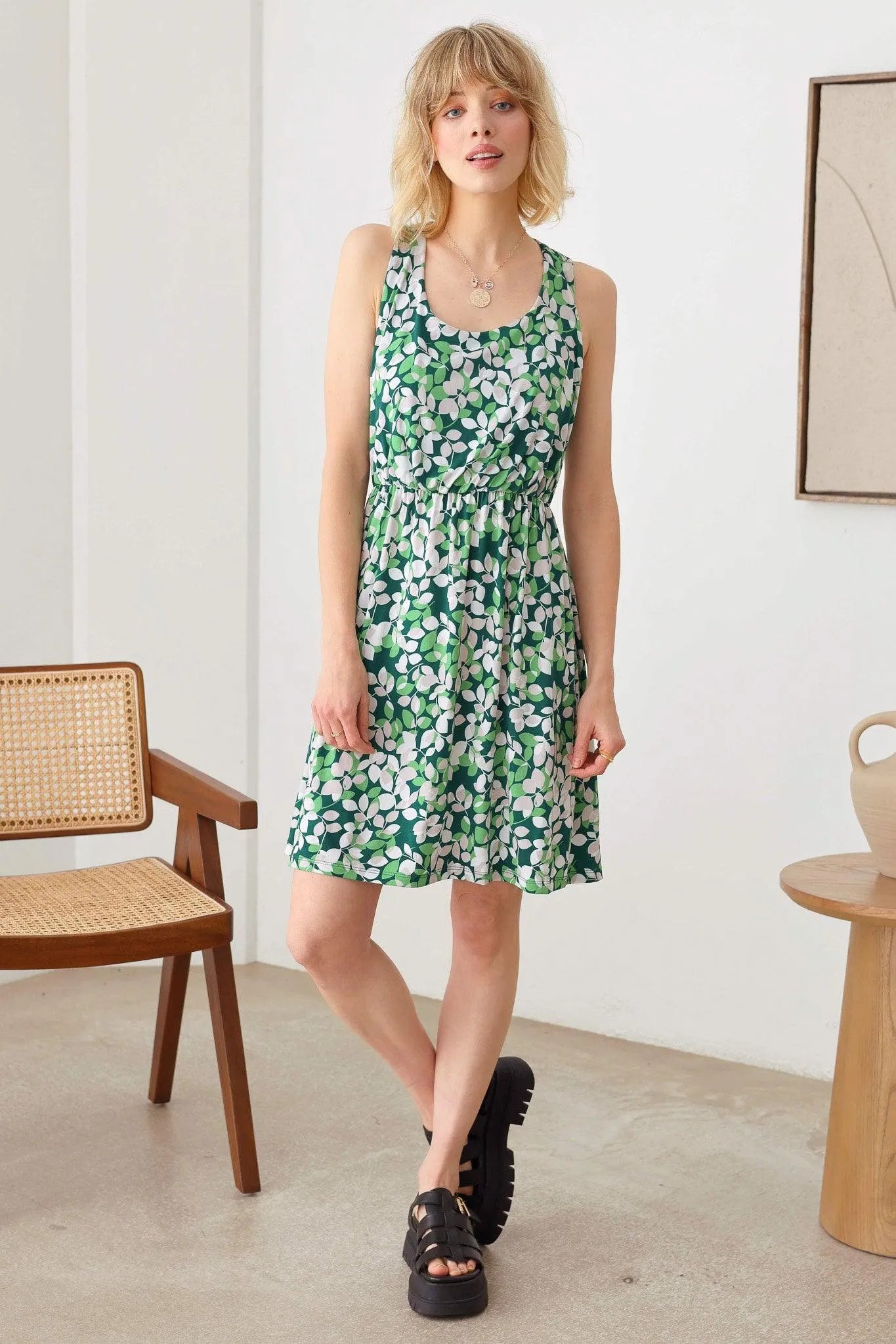 Casual Floral Print Cross Back Sleeve Flowy Hem Mini Dress - Tasha Apparel Wholesale