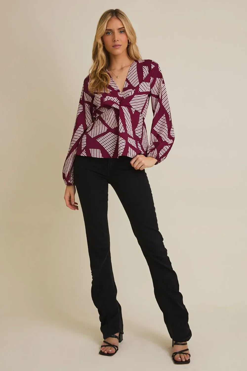 Plus Size Geometric Print Long Sleeve Surplice Peplum Top - Tasha Apparel Wholesale