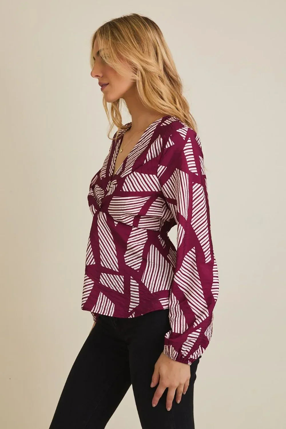 Plus Size Geometric Print Long Sleeve Surplice Peplum Top - Tasha Apparel Wholesale