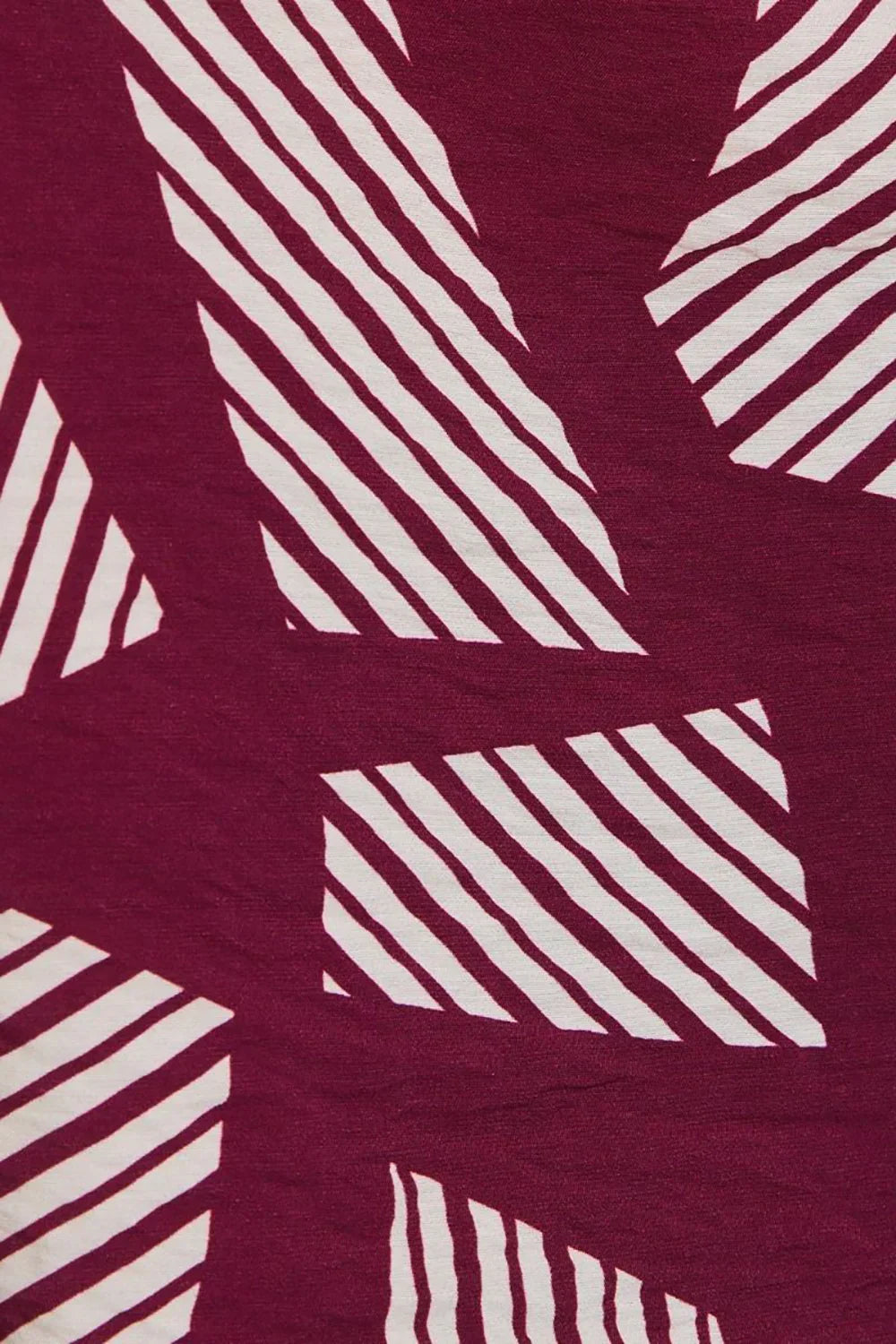 Plus Size Geometric Print Long Sleeve Surplice Peplum Top - Tasha Apparel Wholesale