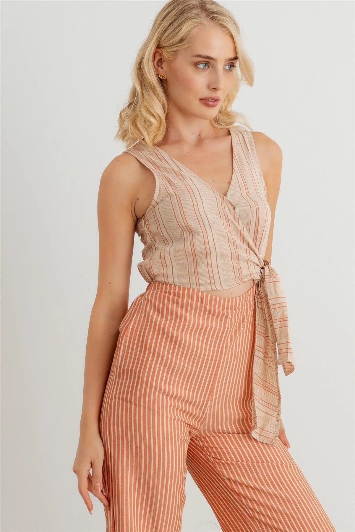 Striped Wrap Tie Neck Sleeveless Cut-Out Front Two Pocket Jumpsuit - Tasha Apparel Wholesale