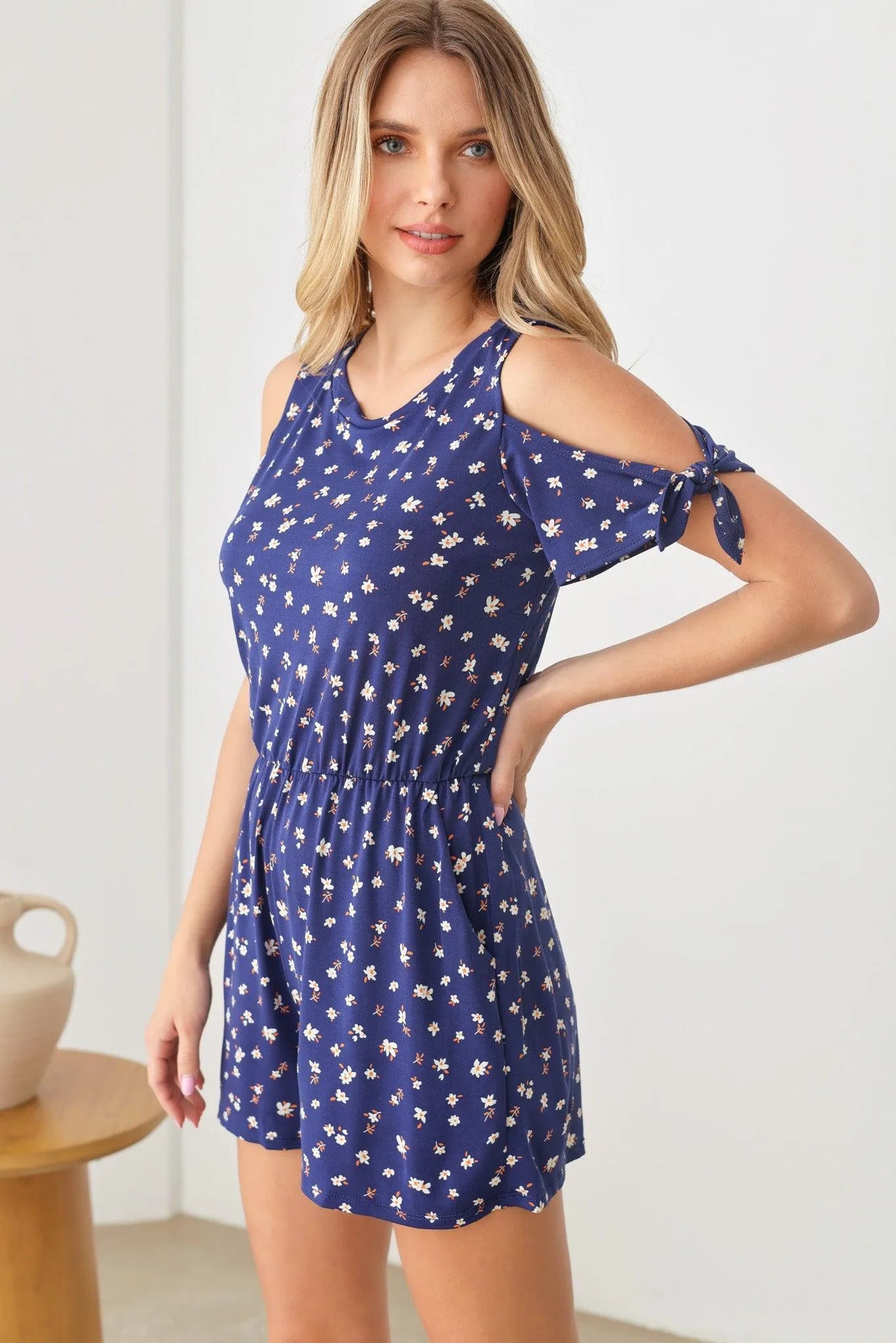 Floral Print Open Shoulder Open Button Back Side Pockets Romper - Tasha Apparel Wholesale