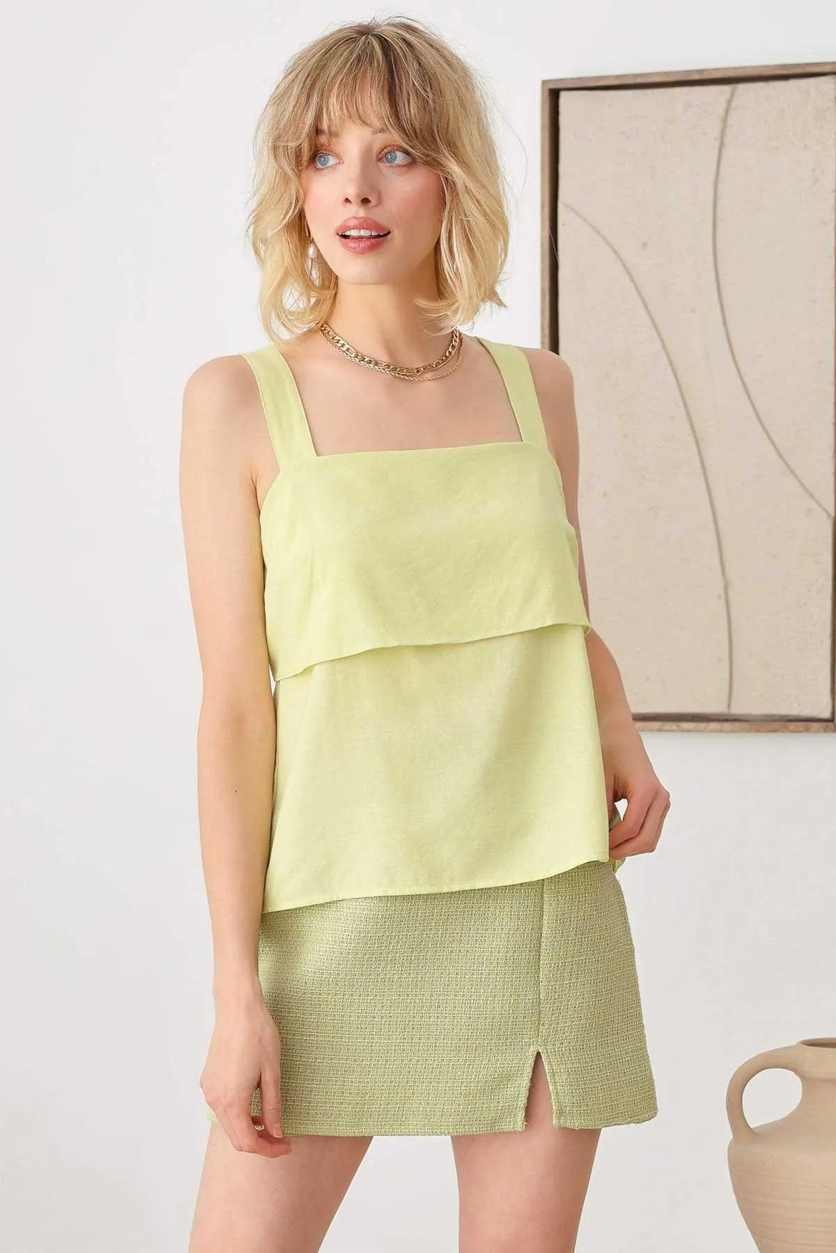 Plain Flowy Ruffle Neckline Sleeveless Back Self Tie Top - Tasha Apparel Wholesale