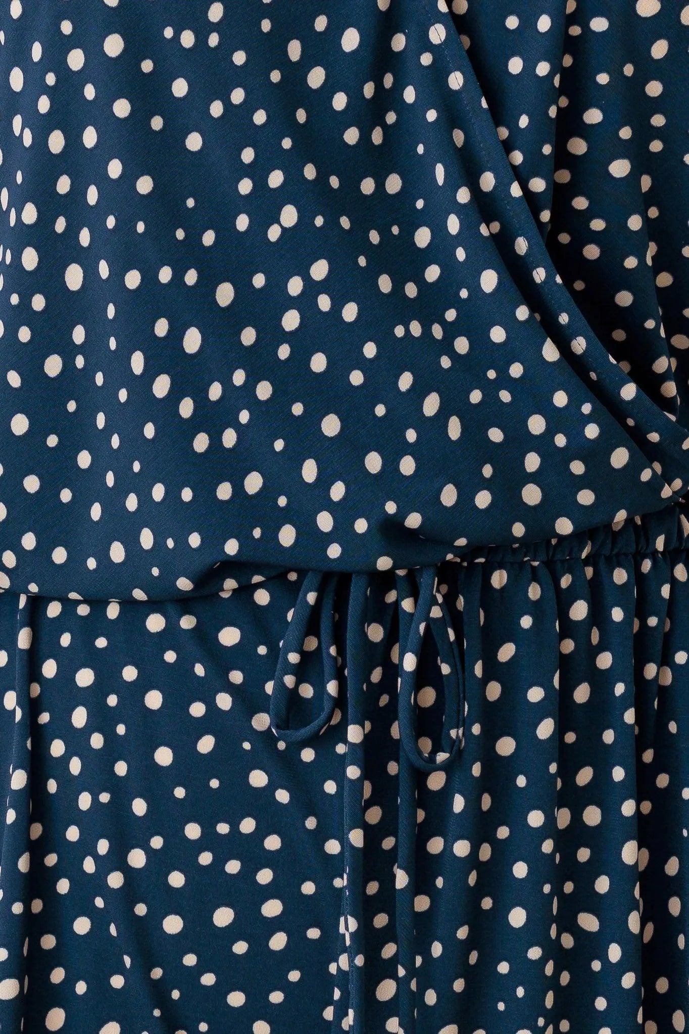 Plus Size Polka Dot Short Sleeve Adjustable Belt Warp Romper - Tasha Apparel Wholesale