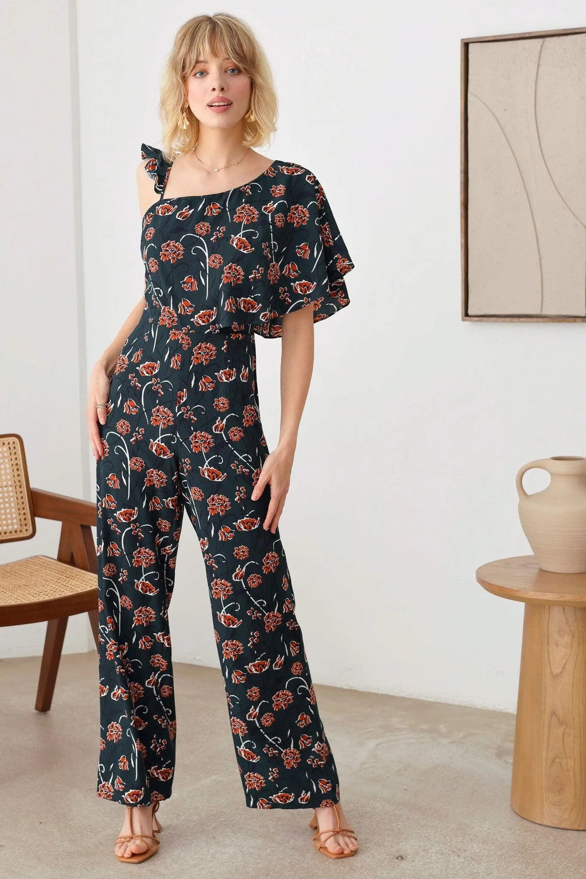 Floral Short Ruffle Sleeve Ruffle Strap Wide Leg Side Zipper Jumpsuit - Tasha Apparel Wholesale