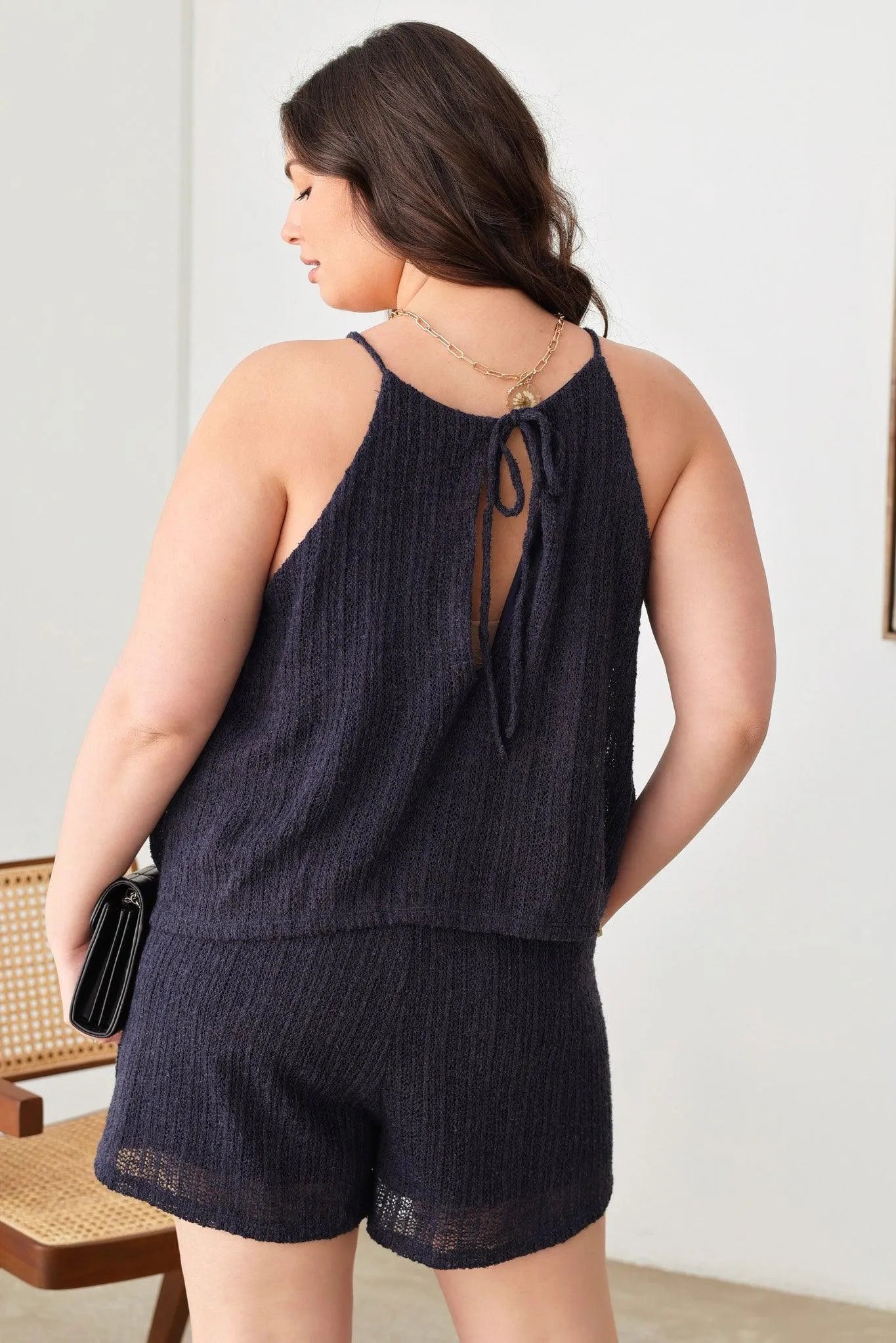 Plus Size Solid Knit Sleeveless Halter Neckline Two Pocket Romper - Tasha Apparel Wholesale