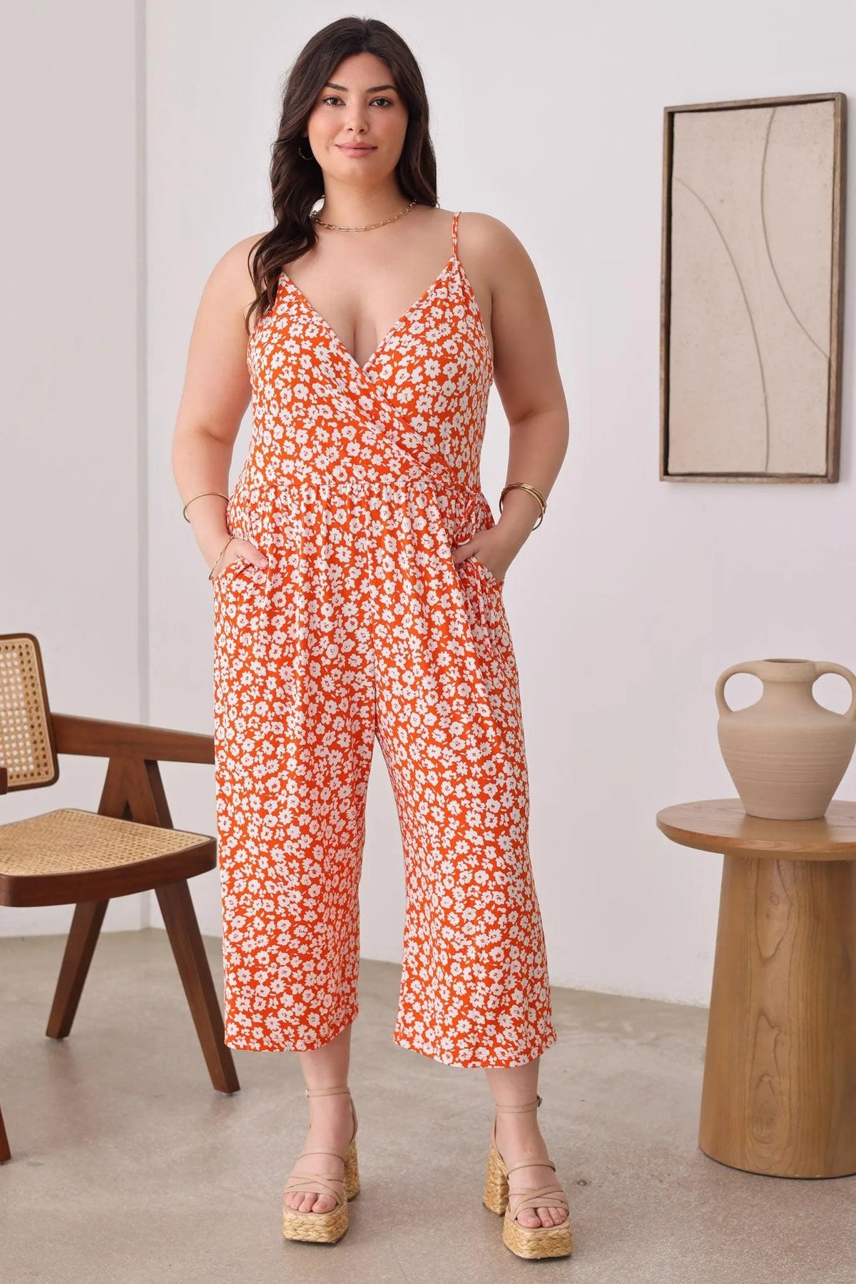 Plus Size Warp Floral Print Wide Capri Leg Side Tie Jumpsuit - Tasha Apparel Wholesale