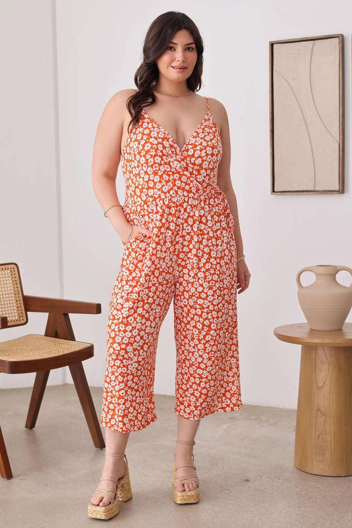 Plus Size Warp Floral Print Wide Capri Leg Side Tie Jumpsuit - Tasha Apparel Wholesale