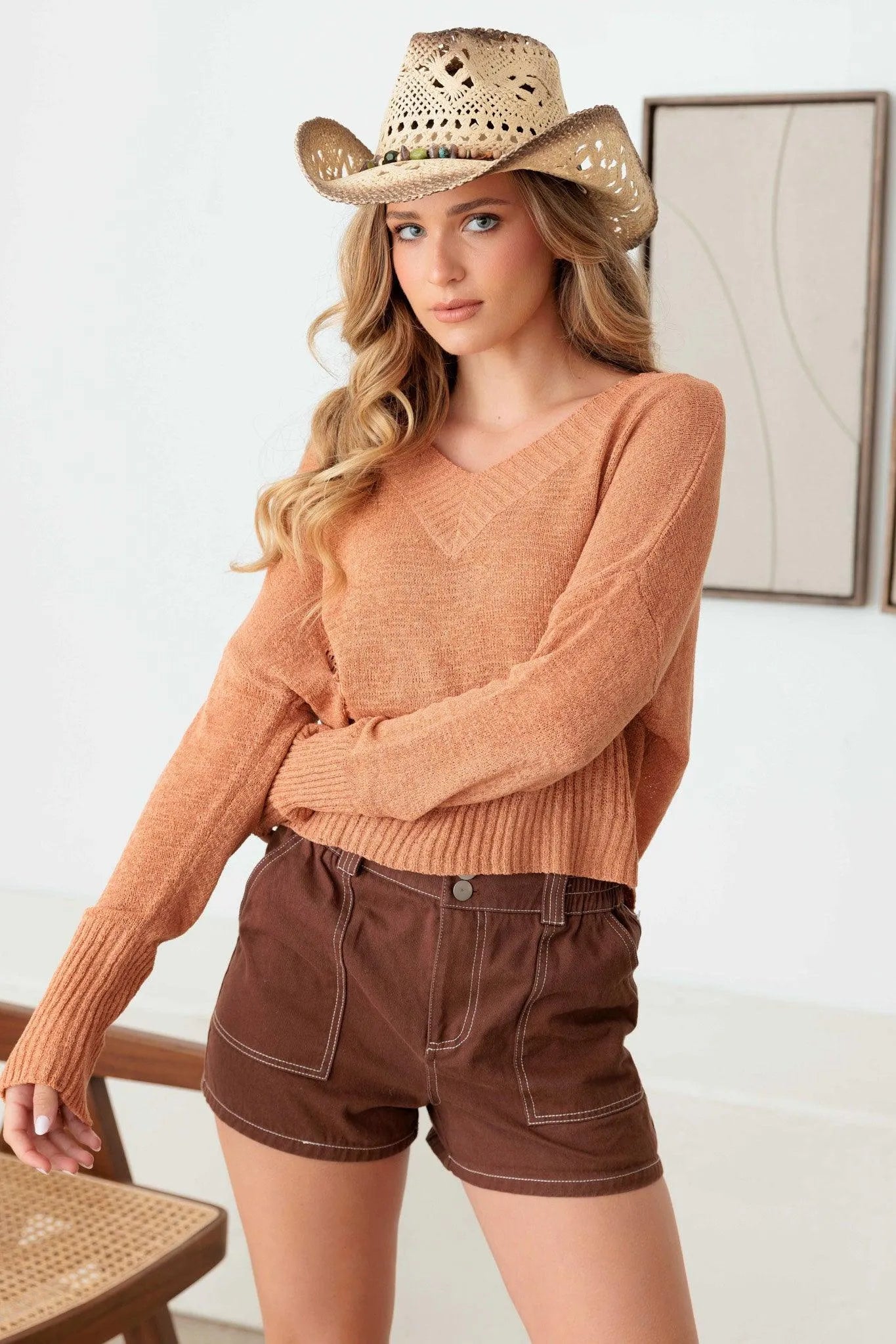 Relaxed V-Neck Side Cut Out Long Sleeve Sweater - Tasha Apparel Wholesale