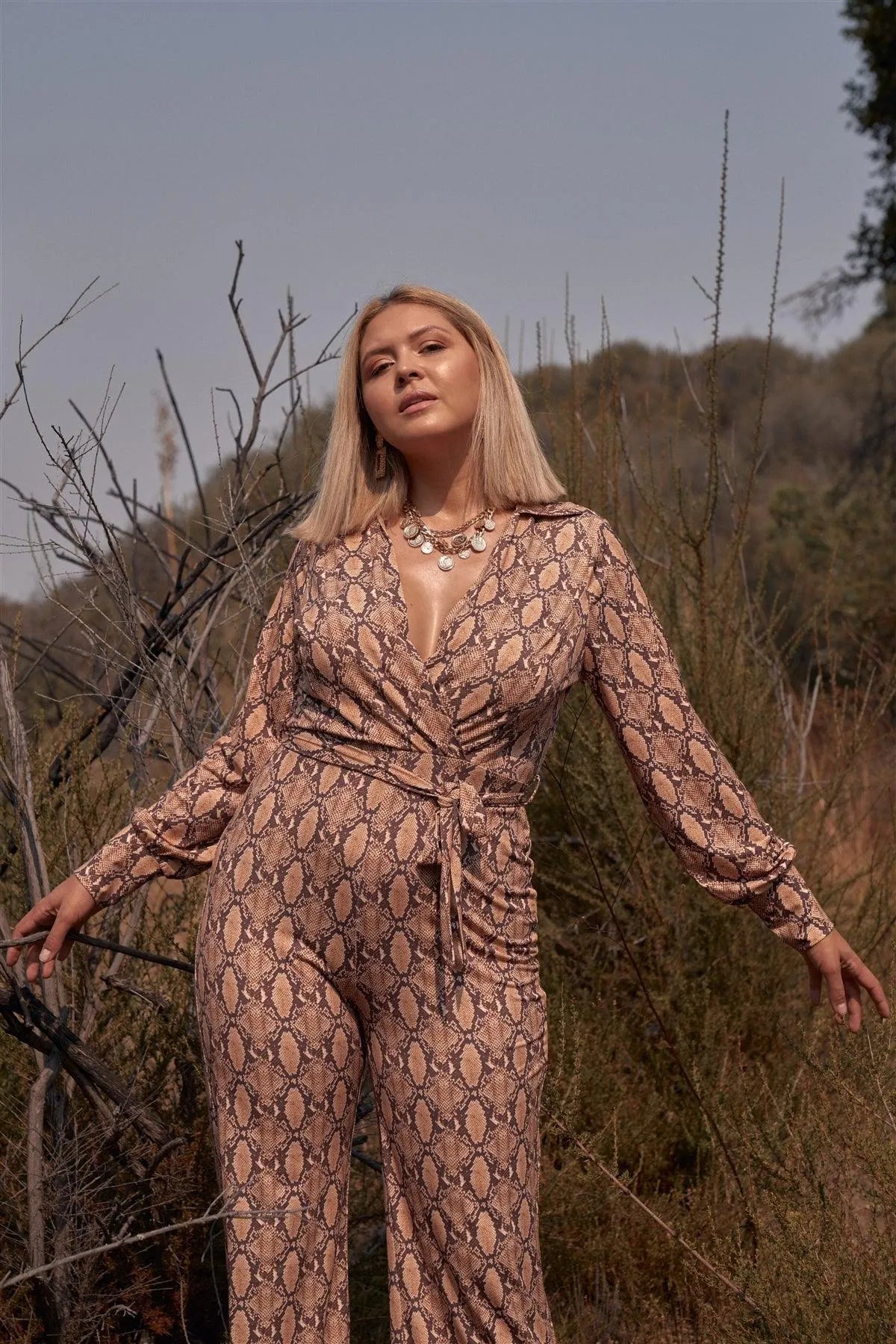 Junior Plus Size Python Print Long Sleeve Wrap V-Neck Flare Leg Jumpsuit /2-2-2 - Tasha Apparel Wholesale