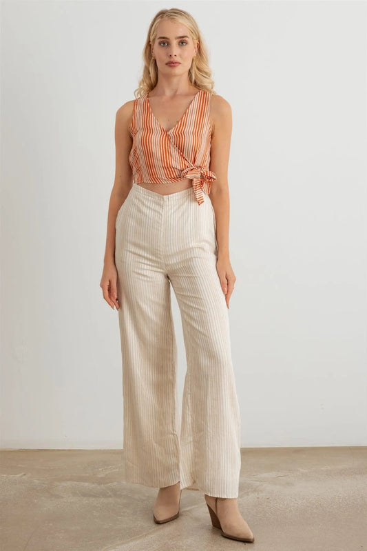 Striped Wrap Tie Neck Sleeveless Cut-Out Front Two Pocket Jumpsuit - Tasha Apparel Wholesale
