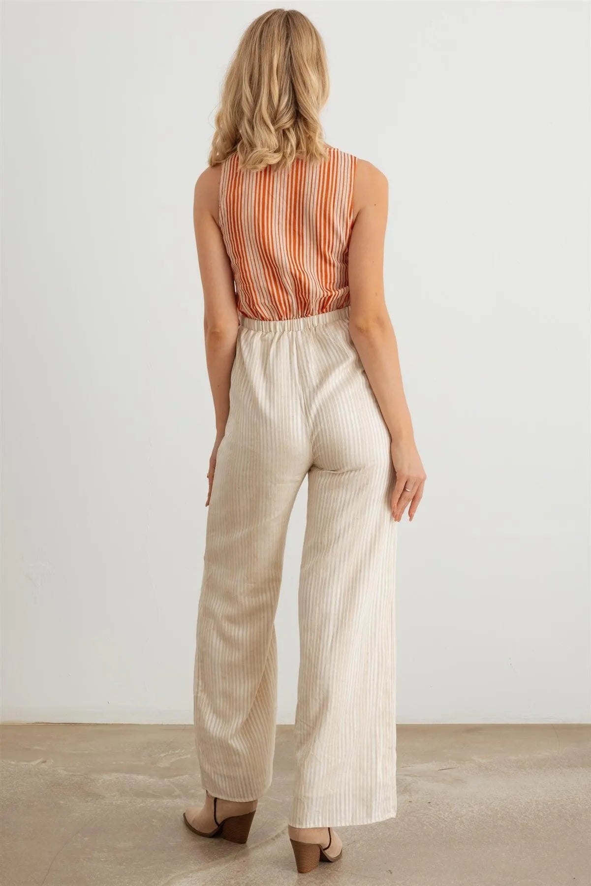 Striped Wrap Tie Neck Sleeveless Cut-Out Front Two Pocket Jumpsuit - Tasha Apparel Wholesale