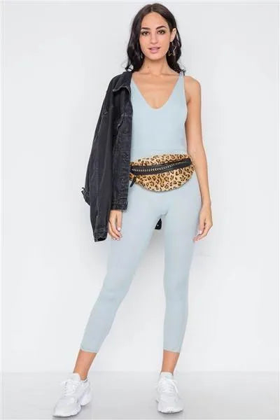 Stretch-Knit Featuring a Ruched V-Neckline Jumpsuit - Tasha Apparel Wholesale