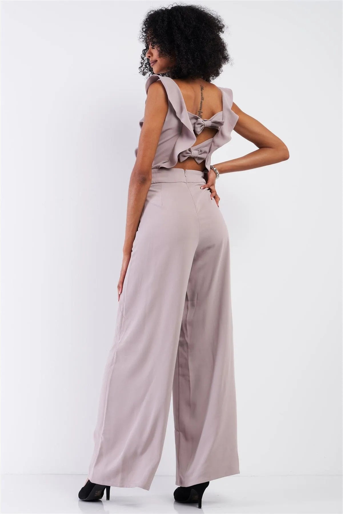 Oyster Sleeveless Front Ruffle Open Back Bow Tie Detail Wide Leg Pleated Jumpsuit - Tasha Apparel Wholesale