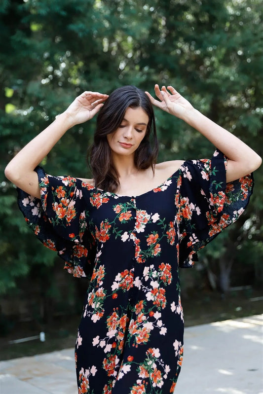 Black Multi Color Floral Print Off-The-Shoulder Flare Sleeve Back Tie Detail Wide Leg Jumpsuit /1-2-2 - Tasha Apparel Wholesale