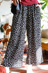 Monochrome Animal Print Smocked Ruffle Waist Wide Leg Pants /1-2-2-2 - Tasha Apparel Wholesale