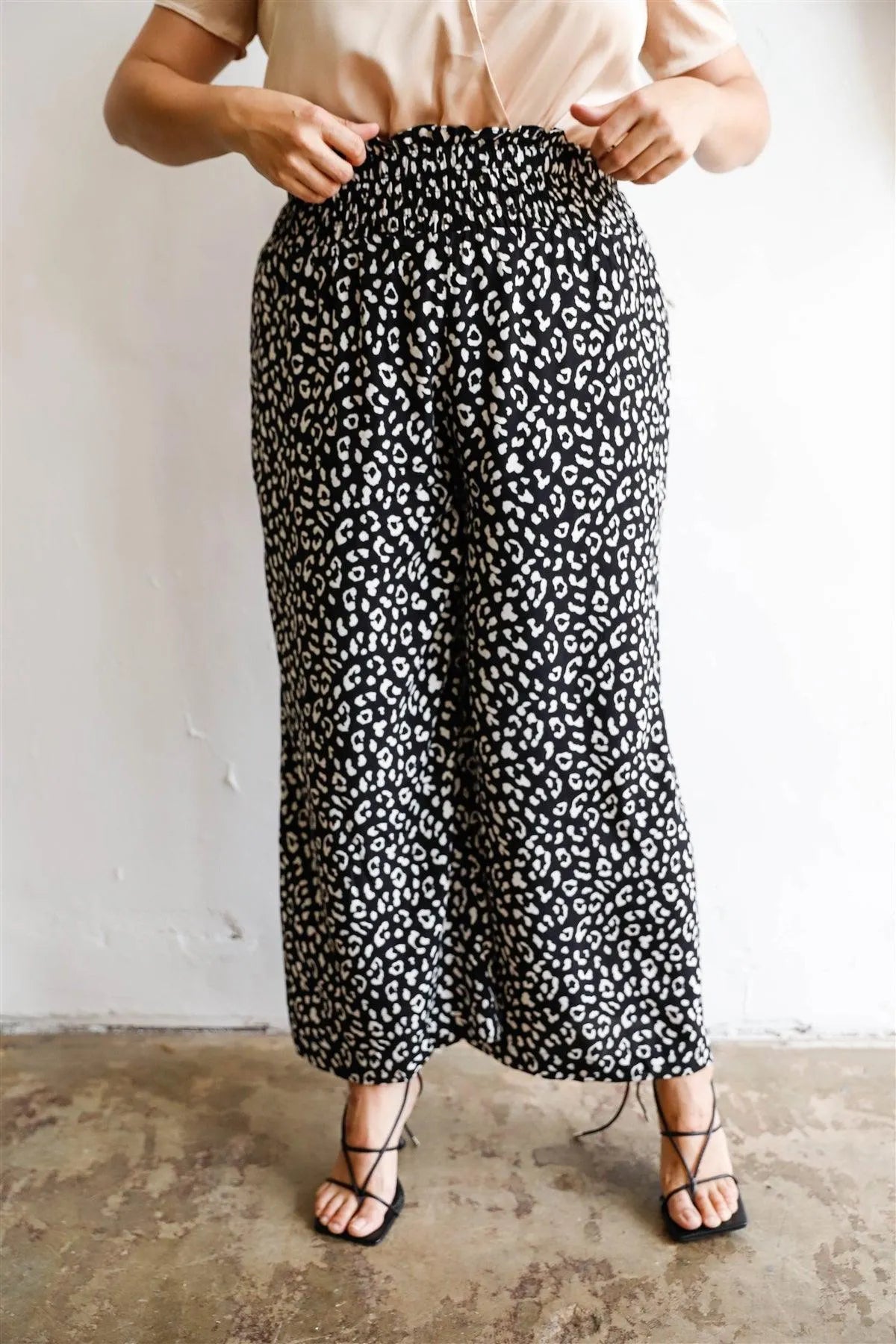 Junior Plus Monochrome Animal Print Smocked Ruffle Waist Wide Leg Pants /1-3-1 - Tasha Apparel Wholesale