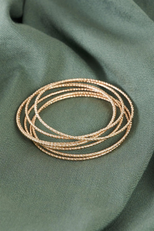 Gold Ribbed 7 Ring Bracelet /6 Pieces - Tasha Apparel Wholesale