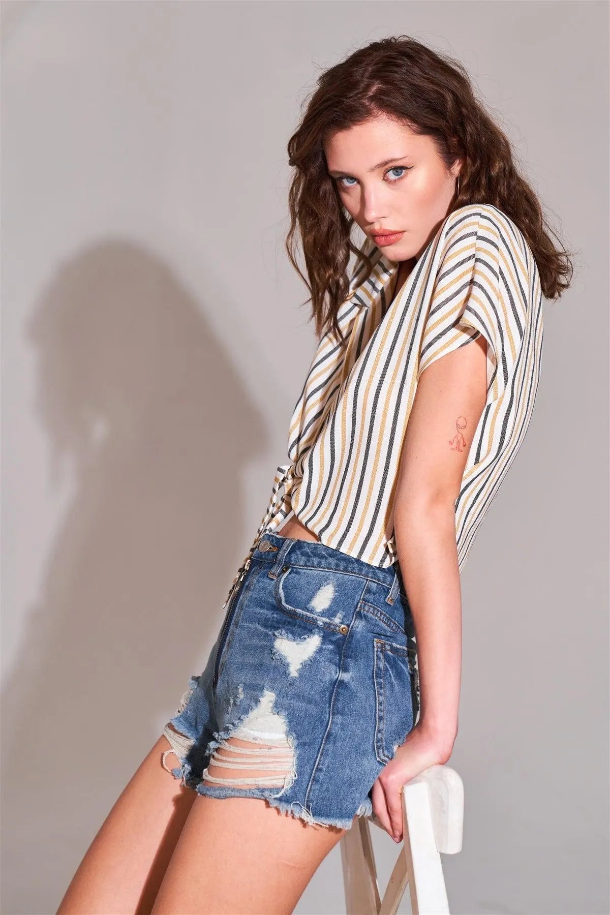 Ripped High-Waist Zip-Up Raw Hem Distressed Denim Shorts - Tasha Apparel Wholesale