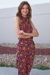Navy Multi Floral Print Self-Tie Mock Neck Sleeveless Elasticated Waistline Side Pockets Jumpsuit /1-2-2-1 - Tasha Apparel Wholesale