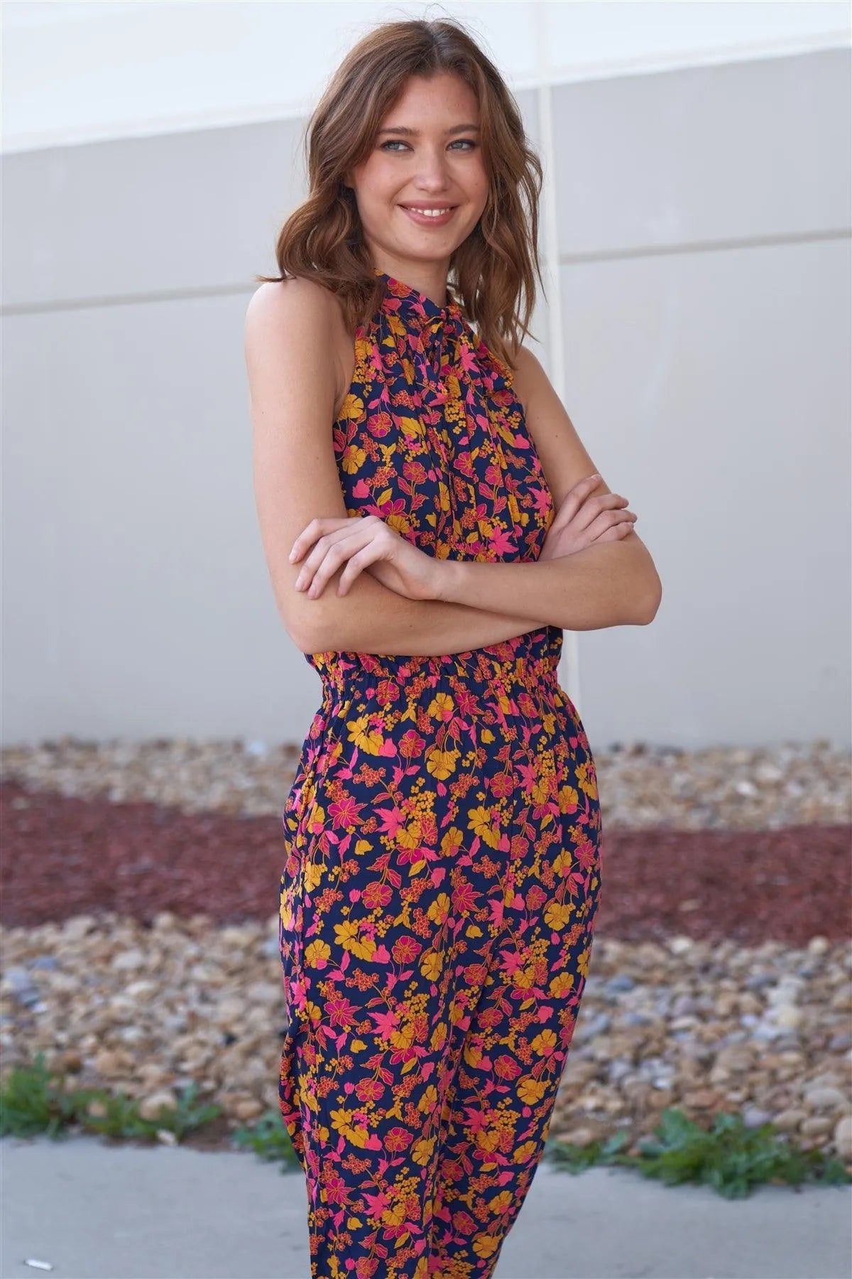 Navy Multi Floral Print Self-Tie Mock Neck Sleeveless Elasticated Waistline Side Pockets Jumpsuit /1-2-2-1 - Tasha Apparel Wholesale