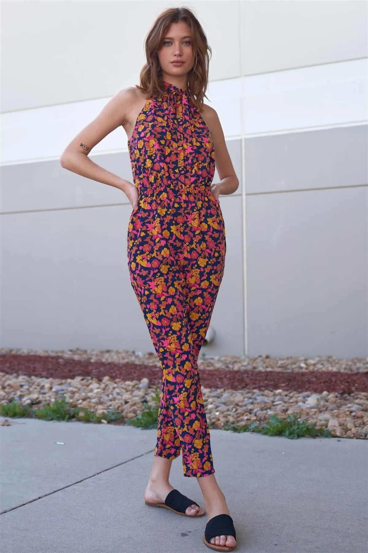 Navy Multi Floral Print Self-Tie Mock Neck Sleeveless Elasticated Waistline Side Pockets Jumpsuit /1-2-2-1 - Tasha Apparel Wholesale