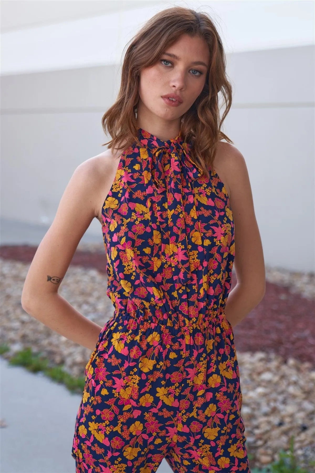 Navy Multi Floral Print Self-Tie Mock Neck Sleeveless Elasticated Waistline Side Pockets Jumpsuit /1-2-2-1 - Tasha Apparel Wholesale