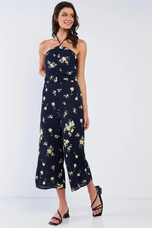 Navy Blue Floral Print Sleeveless Gathered Chest Detail Open Back Halter Neck Tie Wide Leg Mini Jumpsuit /1-2-2-1 - Tasha Apparel Wholesale