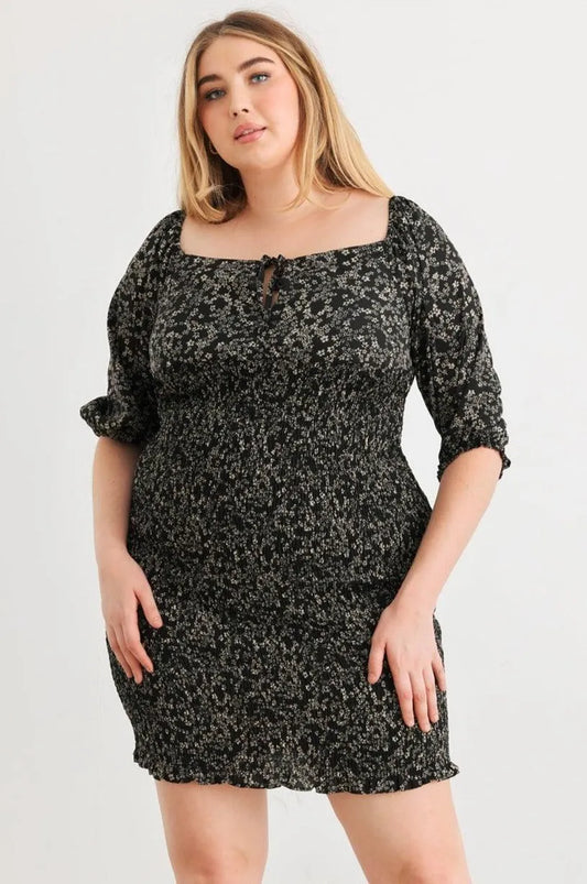 Plus Size Floral Smocked Puff Sleeve Tie Neck Mini Dress - Tasha Apparel Wholesale